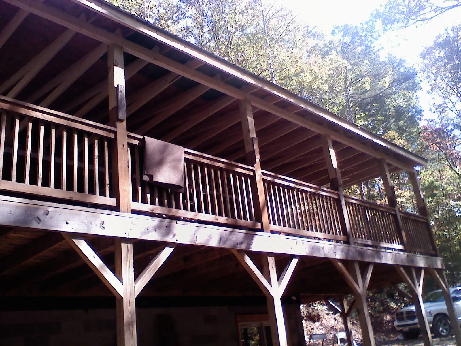 Timber framing under a new elevated porch and deck — Roof Leak Repair in Amboy by Roofing Brothers
